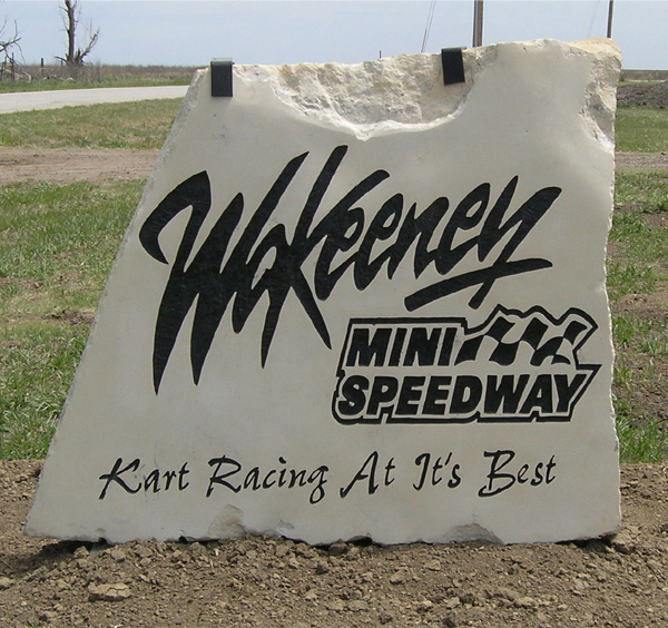 WaKeeney Mini Speedway rock sign in front of the track